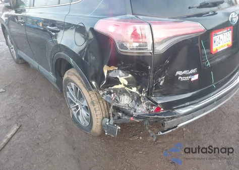 2018 Toyota Rav4 Hybrid Xle z USA, uszkodzony, nr VIN JTMRJREV4JD172555